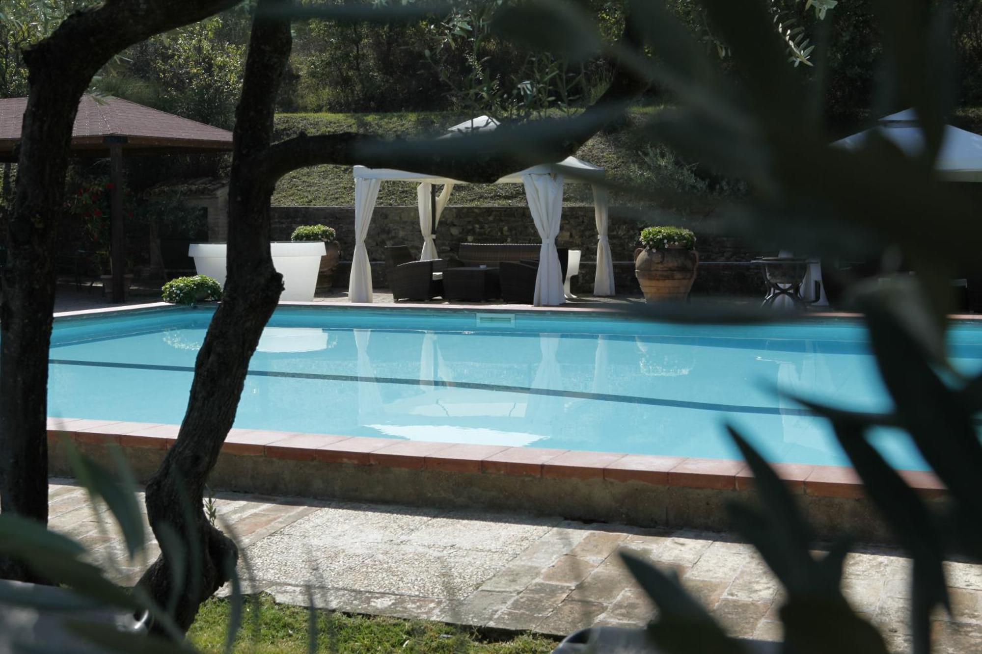 Il Poggio Dei Pettirossi Guest House Беваня Екстериор снимка