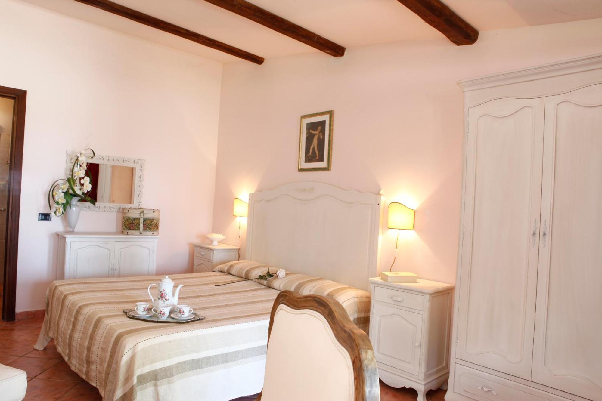 Il Poggio Dei Pettirossi Guest House Беваня Екстериор снимка